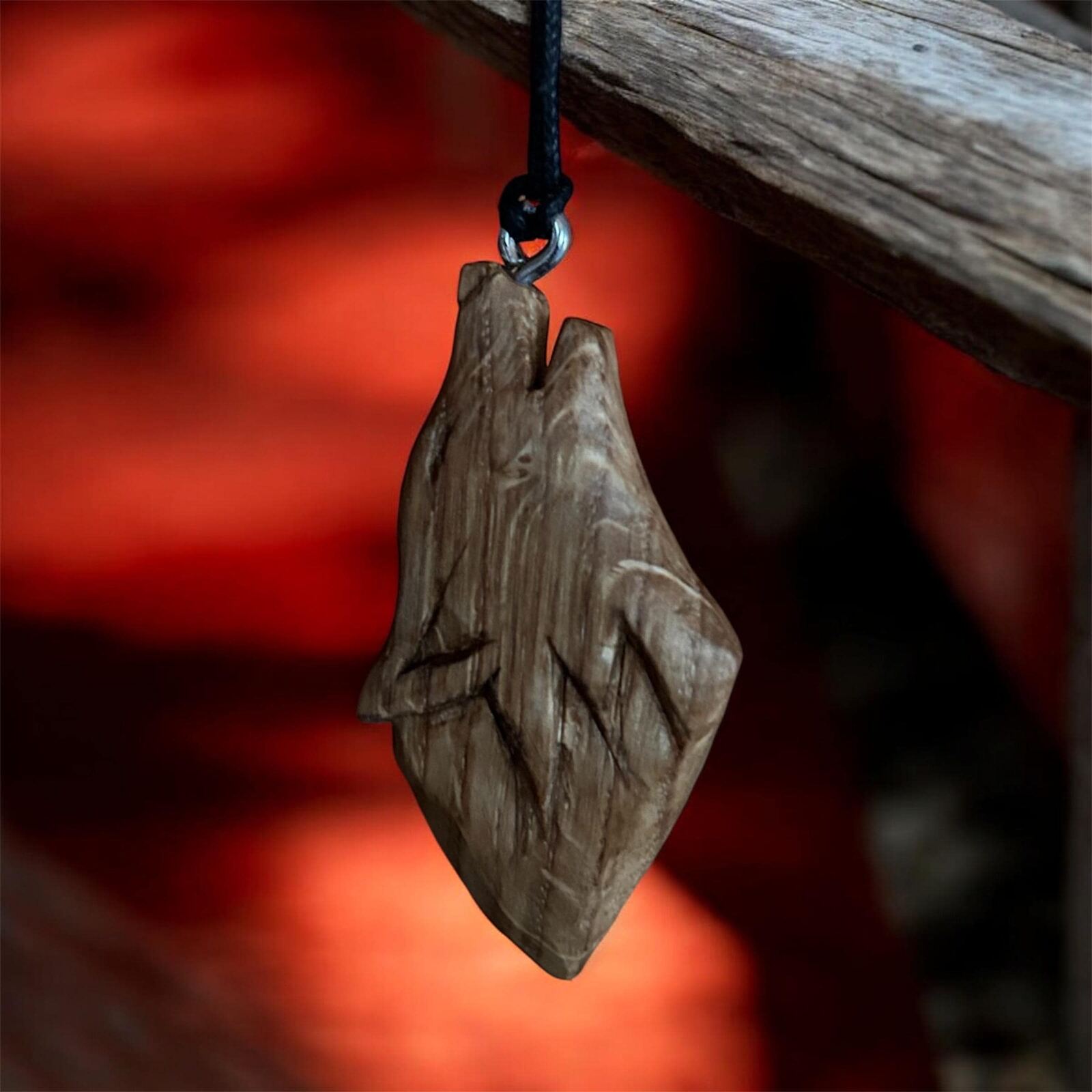 Wolf pendant in bog oak